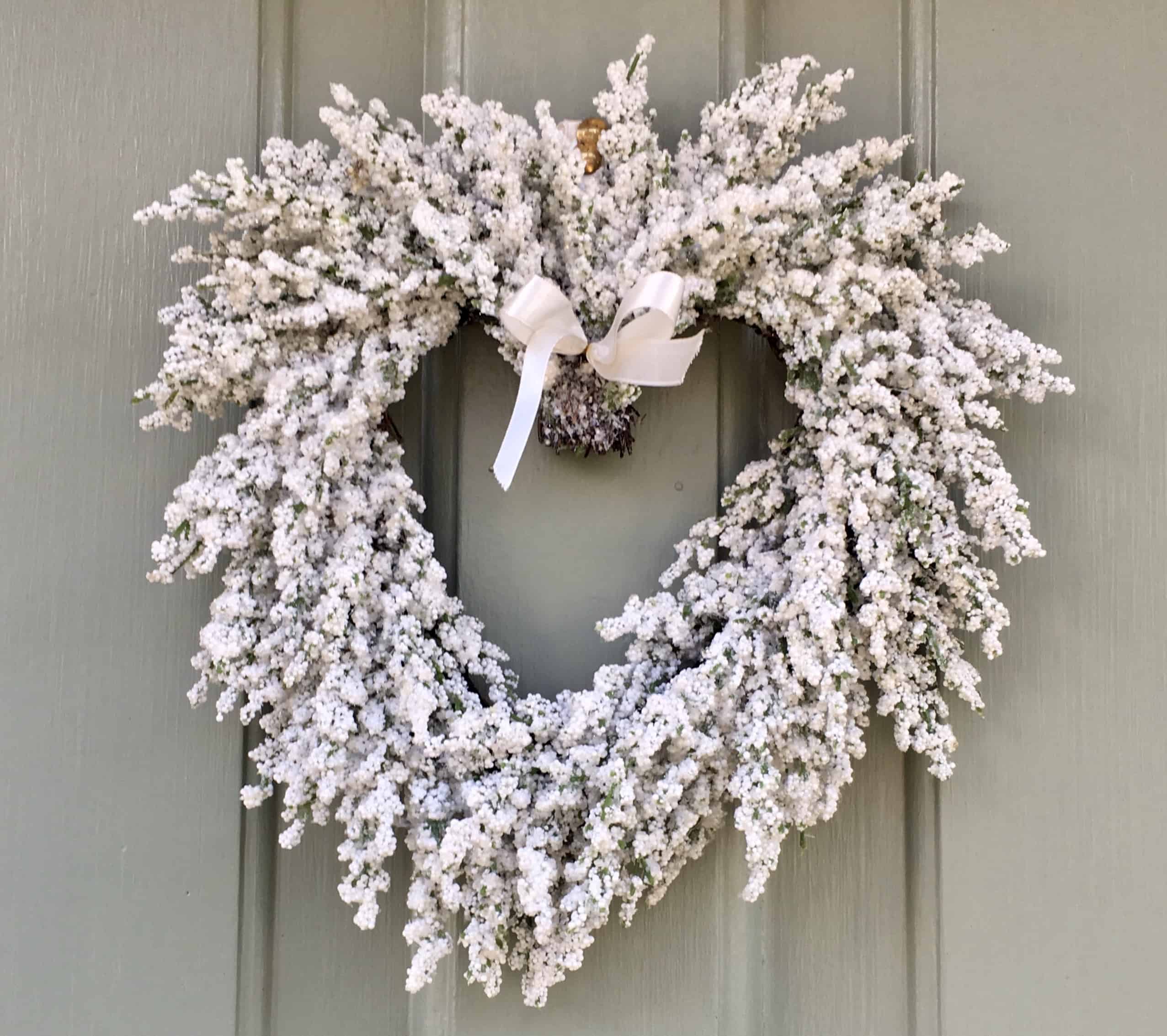 white Christmas wreath on door