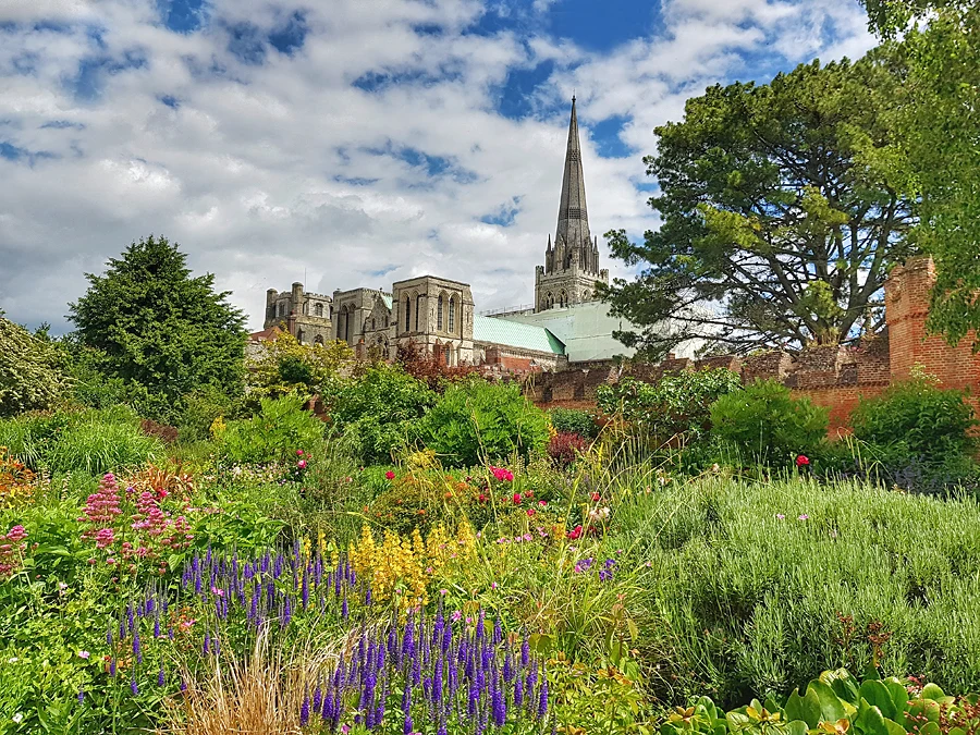 Stunning flower dispay with a backdrop of Chichester Cathedral, one of our favourite gardens in Sussex