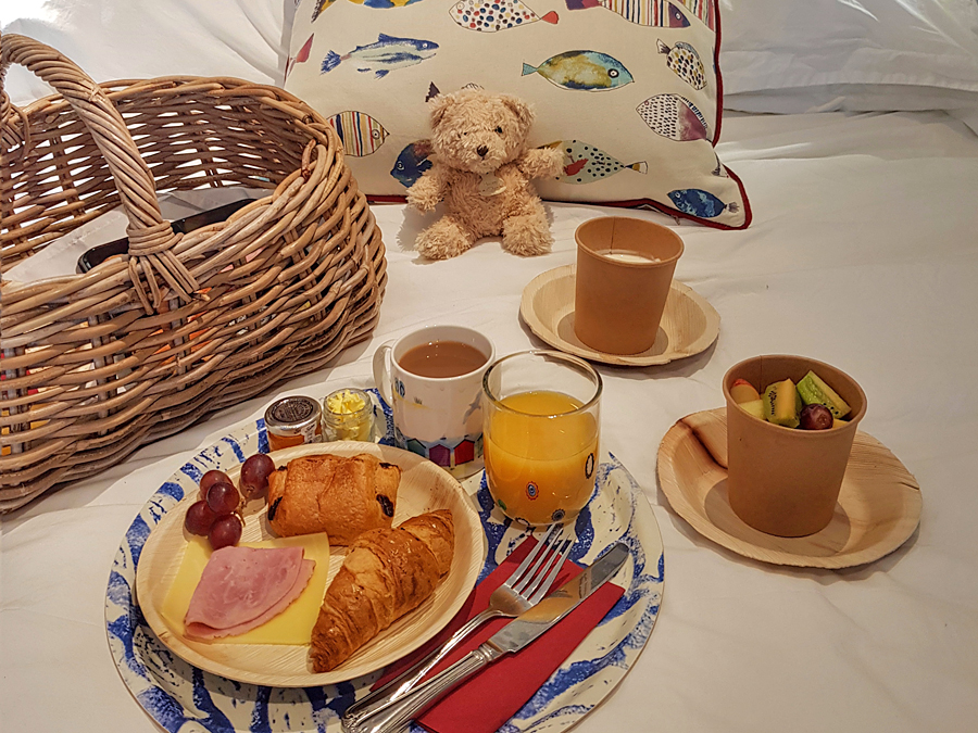 Breakfast in bed at the Beach Huts, West Sussex, UK