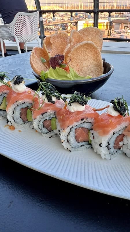 shrimp crackers with avocado wasabi puree and Salmon Avocado Sushi Rolls