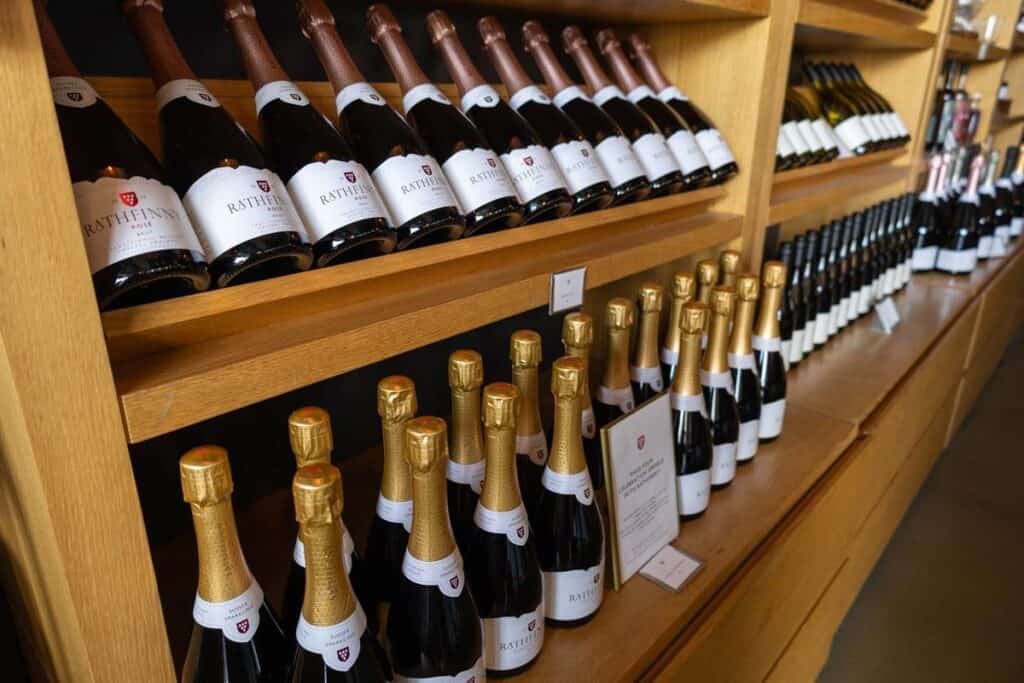 Shelves of bottles of Rathfinny Sussex Sparkling for sale in their Cellar Door